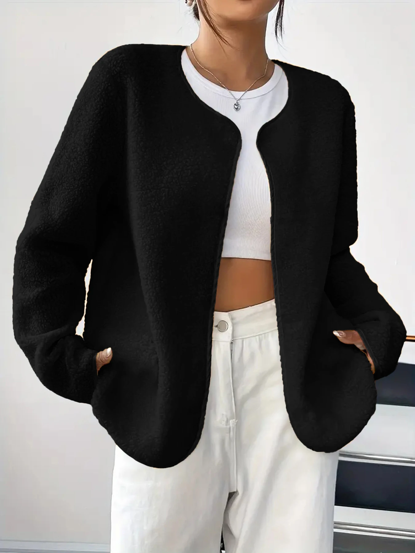 Herfst- en wintermode, eenvoudig en elegant temperament, effen pluche vest met ronde hals en lange mouwen