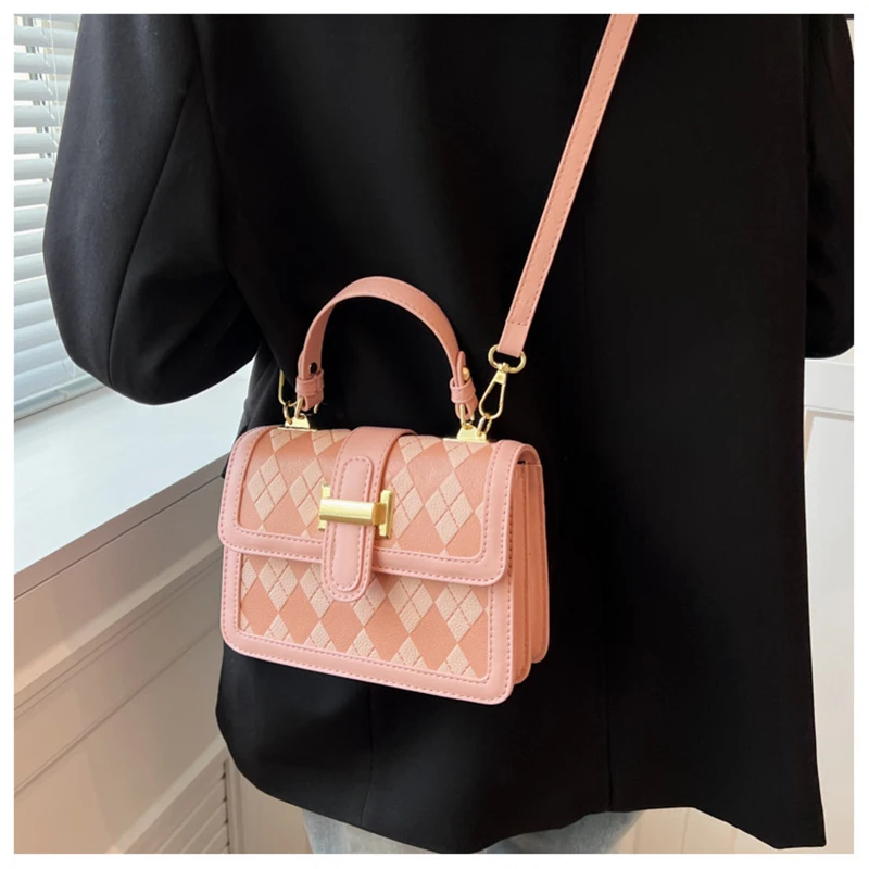 Japanese portable handbag 2023 new trend Joker commuter shoulder slung small bag one shoulder handbag shopping small lady pink.