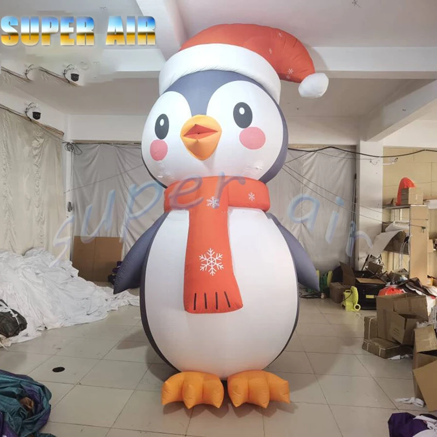 Pinguino natalizio gonfiabile gigante dal design speciale natalizio con cappello per la decorazione della festa