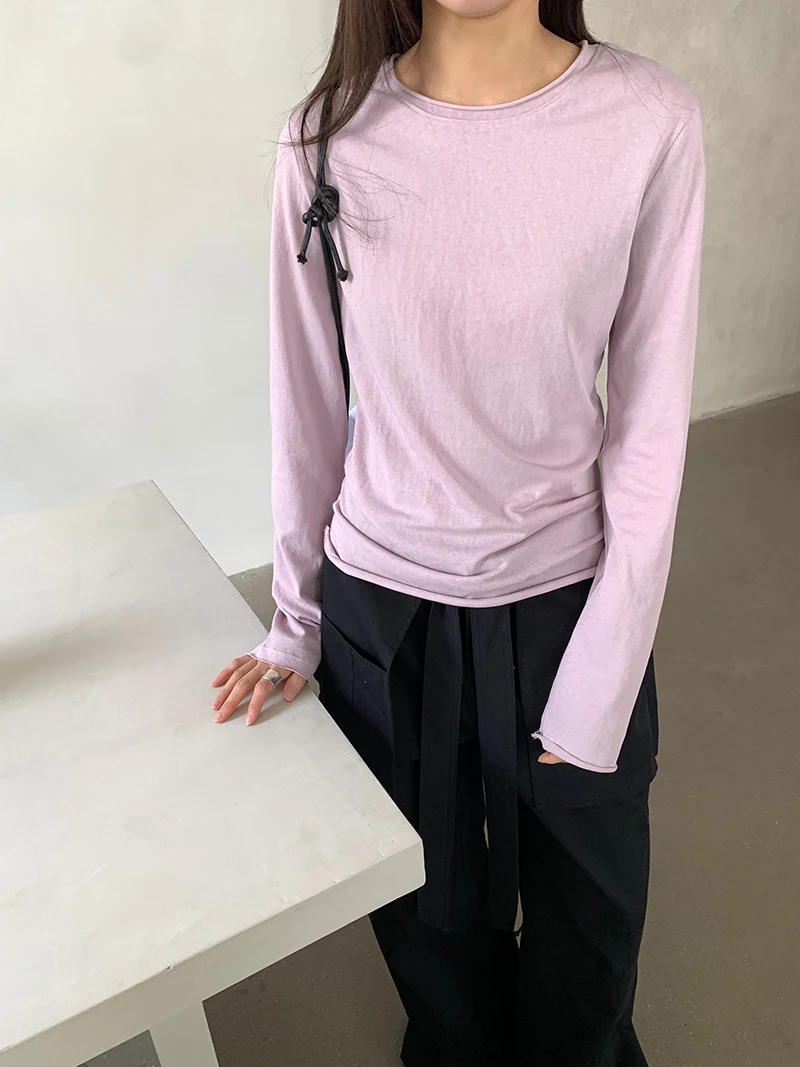 Autumn women's casual solid color round neck long sleeved rolled edge slim fit T-shirt