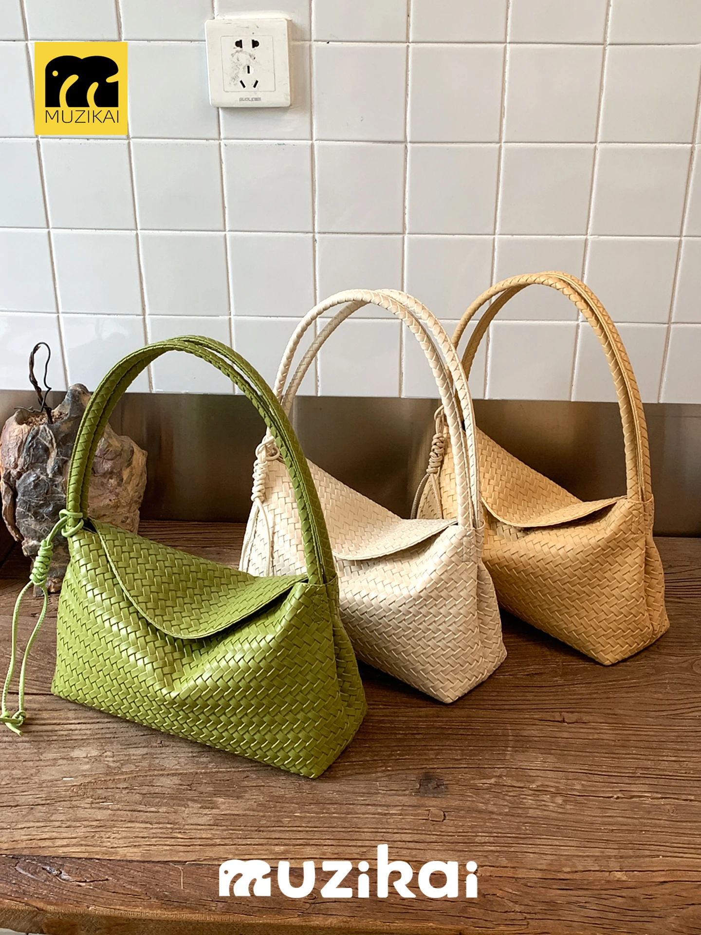 MuziKai Luxury Texture Underarm Pillow Bag Women's 2026 New Autumn High-End Woven Pattern Single Shoulder Bag Soft Handle