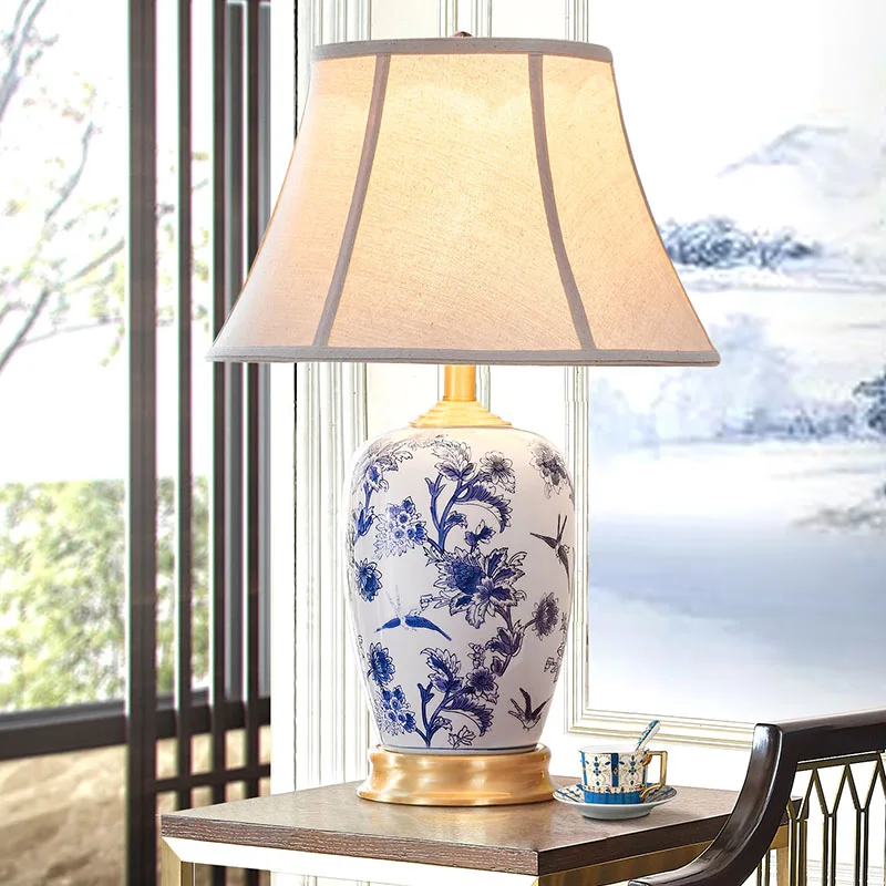 

Blue and white porcelain new Chinese ceramic table lamp bedroom bedside lamp Chinese style creative all copper American living r