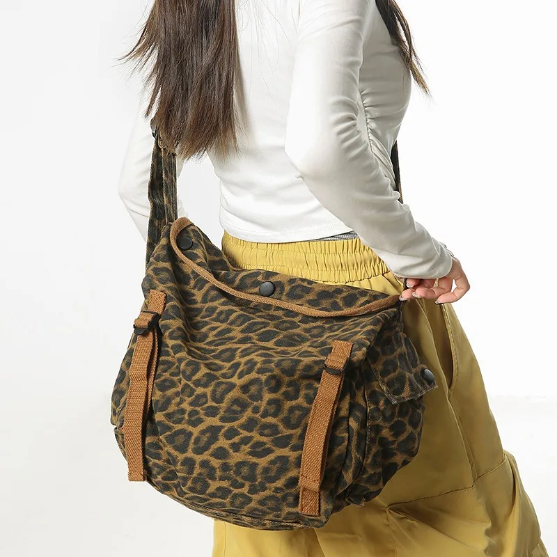 

Леопардовая парусиновая сумка через плечо для женщин, 2025 г., повседневная студенческая женская сумка через плечо, сумка-книга, модные камуфляжные большие сумки