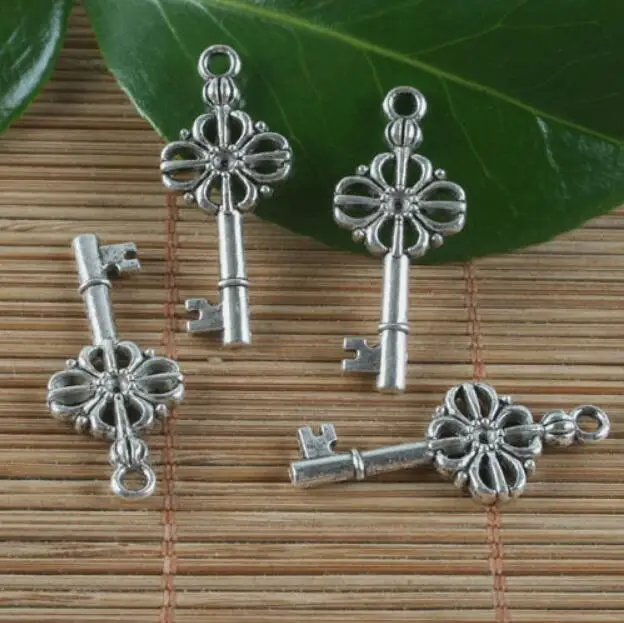 10pcs Tibetan silver two sides flower key pendant H0258