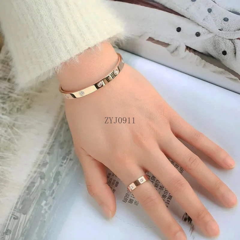 女性用ステンレススチールブレスレット,ゴールドカラーのキュービックジルコニアジュエリー,防水,1セット