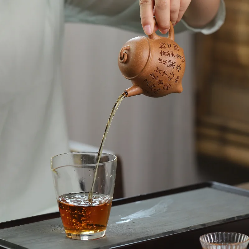 Factory Direct 2026 Zisha handmade teapot raw ore downhill mud three-legged milk ding kung fu tea set Zisha pot wholesale