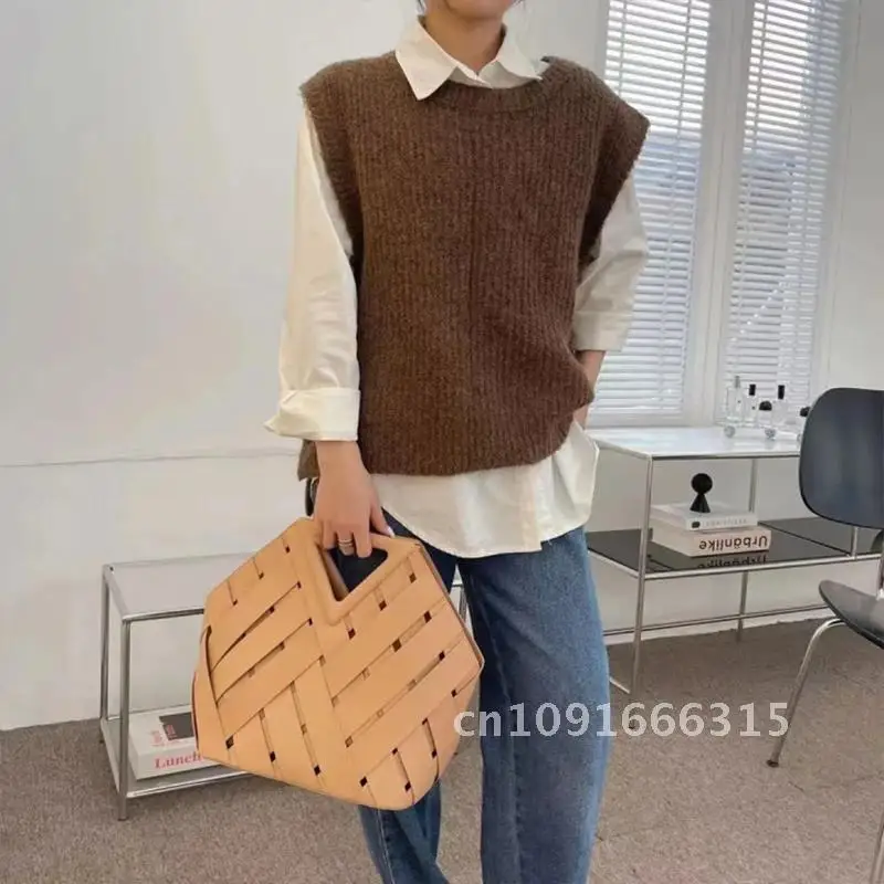 Luxury brand women's bag retro triangle woven hollow leather women's bag large capacity women's casual shoulder crossbody wallet