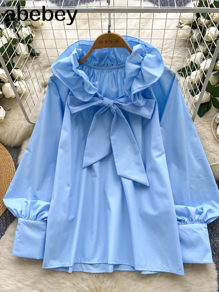 Elegancka bluzka z falbankami, stójką, długim rękawem i motywem motyli, w stylu vintage, luźna, francuska, idealna do biura, w stylu high street, na jesień 2026.