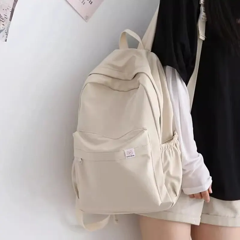 Mochila impermeable de nailon para mujer, bolsa de viaje femenina, Mochila escolar para chicas adolescentes, bolsa de libros de Color sólido