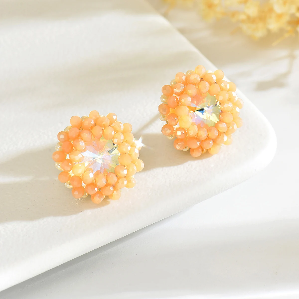 Exquisitely crafted, petite, hand-strung round earrings with a stylish vintage-inspired design—perfect for women to wear at part