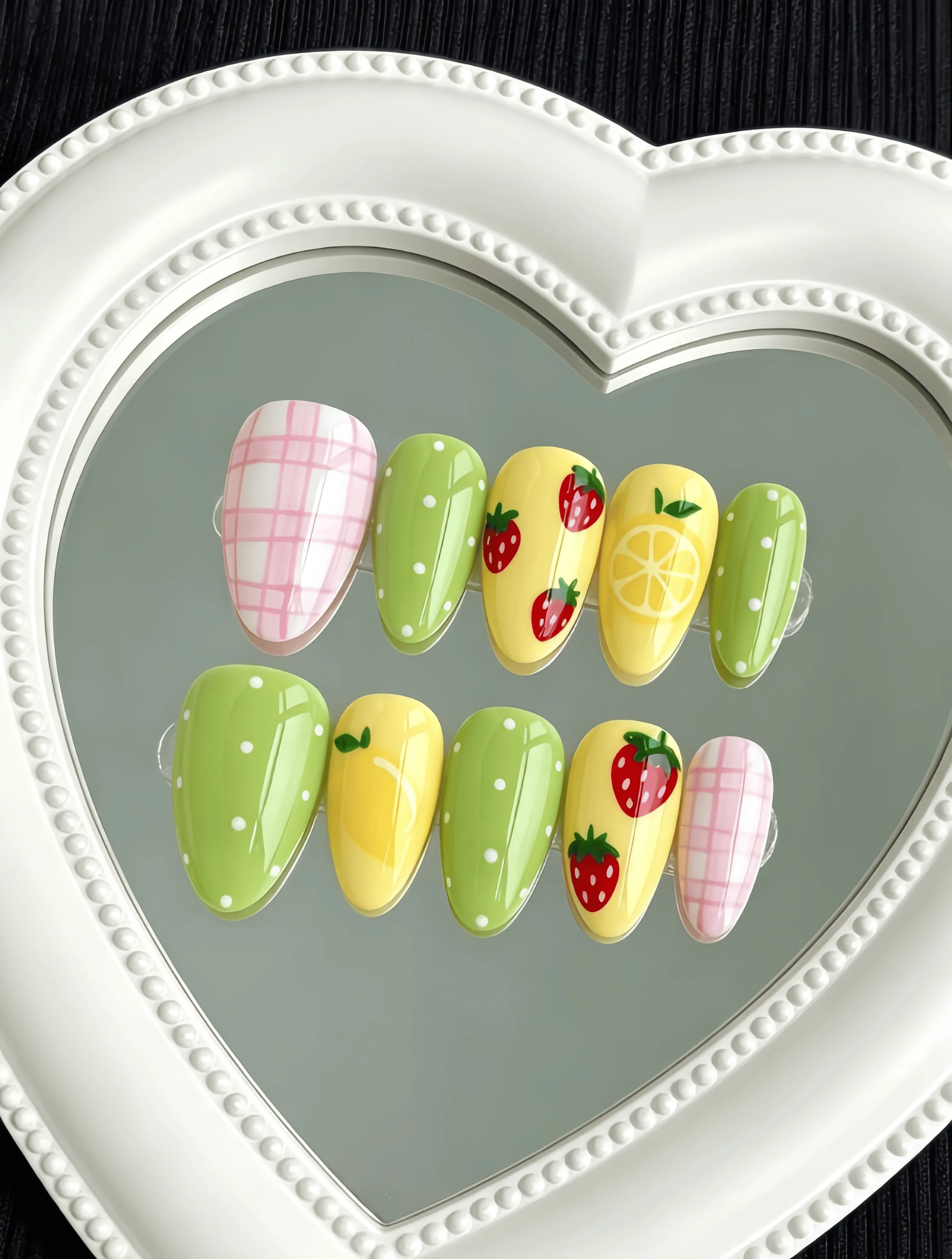 10 Pieces of Handmade Almond-Shaped Full-Cover Nail Tips, Medium Length, with a Fresh Yellow-Green-Pink Color Scheme Featuring Hand-Painted Strawberry and Lemon Designs, Small Polka Dots, and Pink Plaid Patterns, in a Vibrant Summer Sweet Girl Style, Suitable for Women and Girls, Perfect for Summer Vacations, Graduation Season, and as a Gift, Comes with 1 Piece of Jelly Glue and 1 Nail File