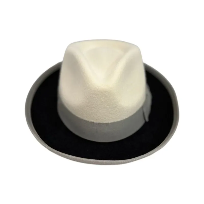A white and black patchwork top hat with knot decoration felt