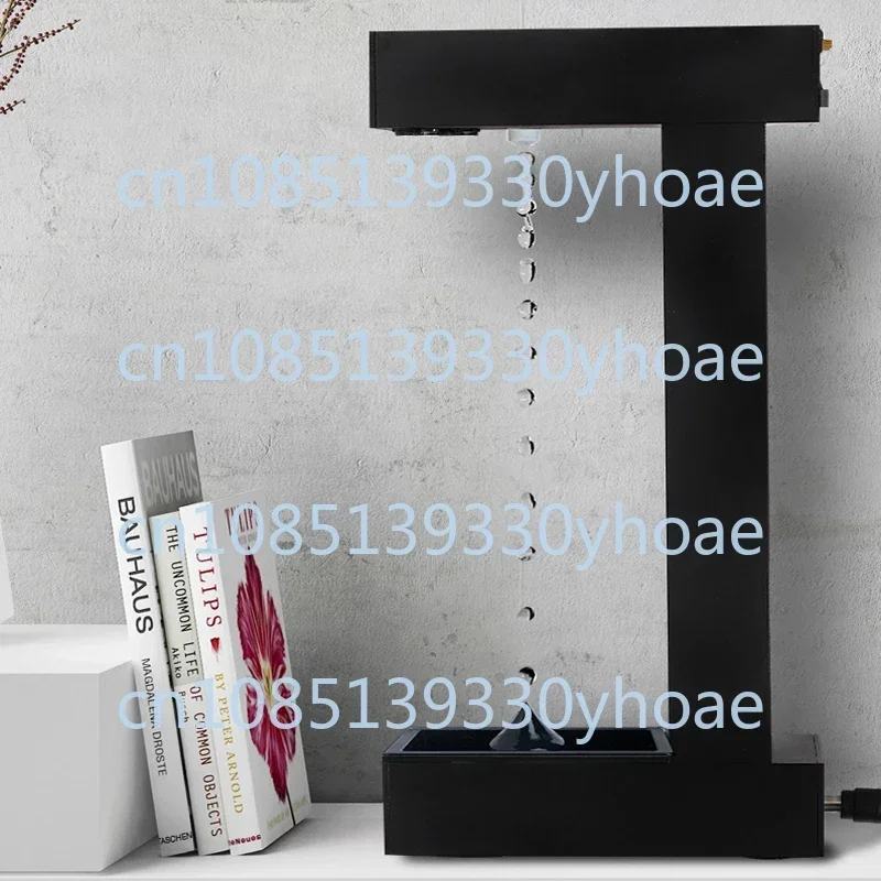 Anti-gravity time hourglass attractive force suspended water droplet backflow ornament black technology