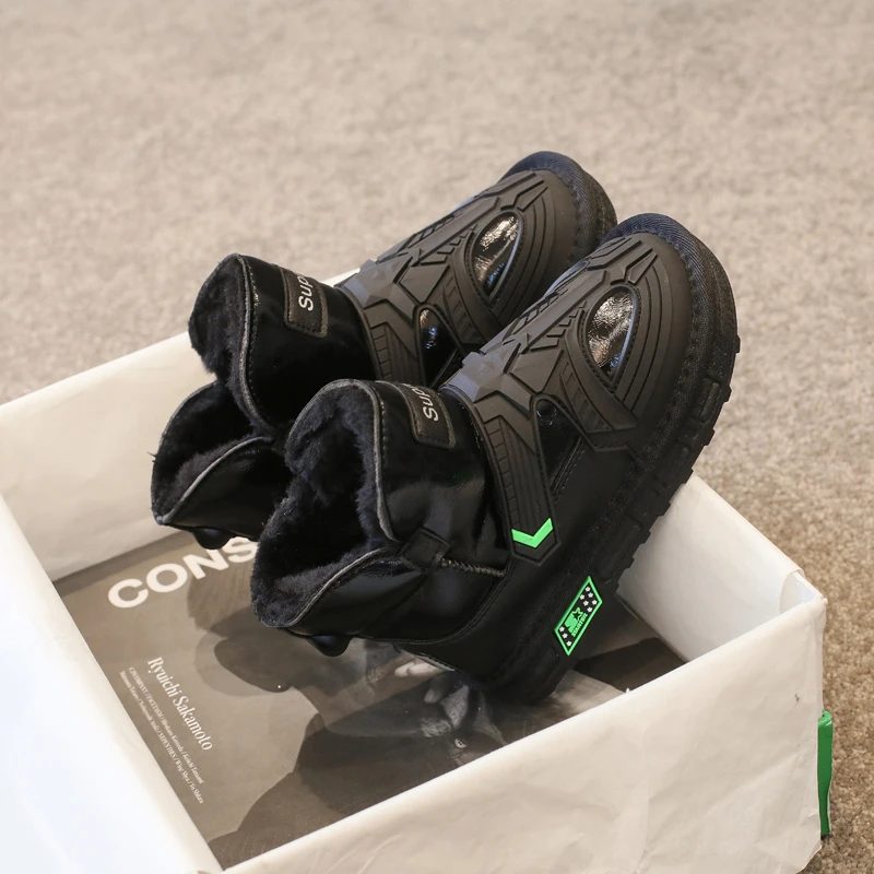 أحذية الثلوج للفتيات أحذية شتوية جديدة للأولاد مبطنة دافئة للأطفال أحذية قطنية للأولاد من الجلد الأسود مضادة للانزلاق أحذية قطنية كبيرة للفتيات