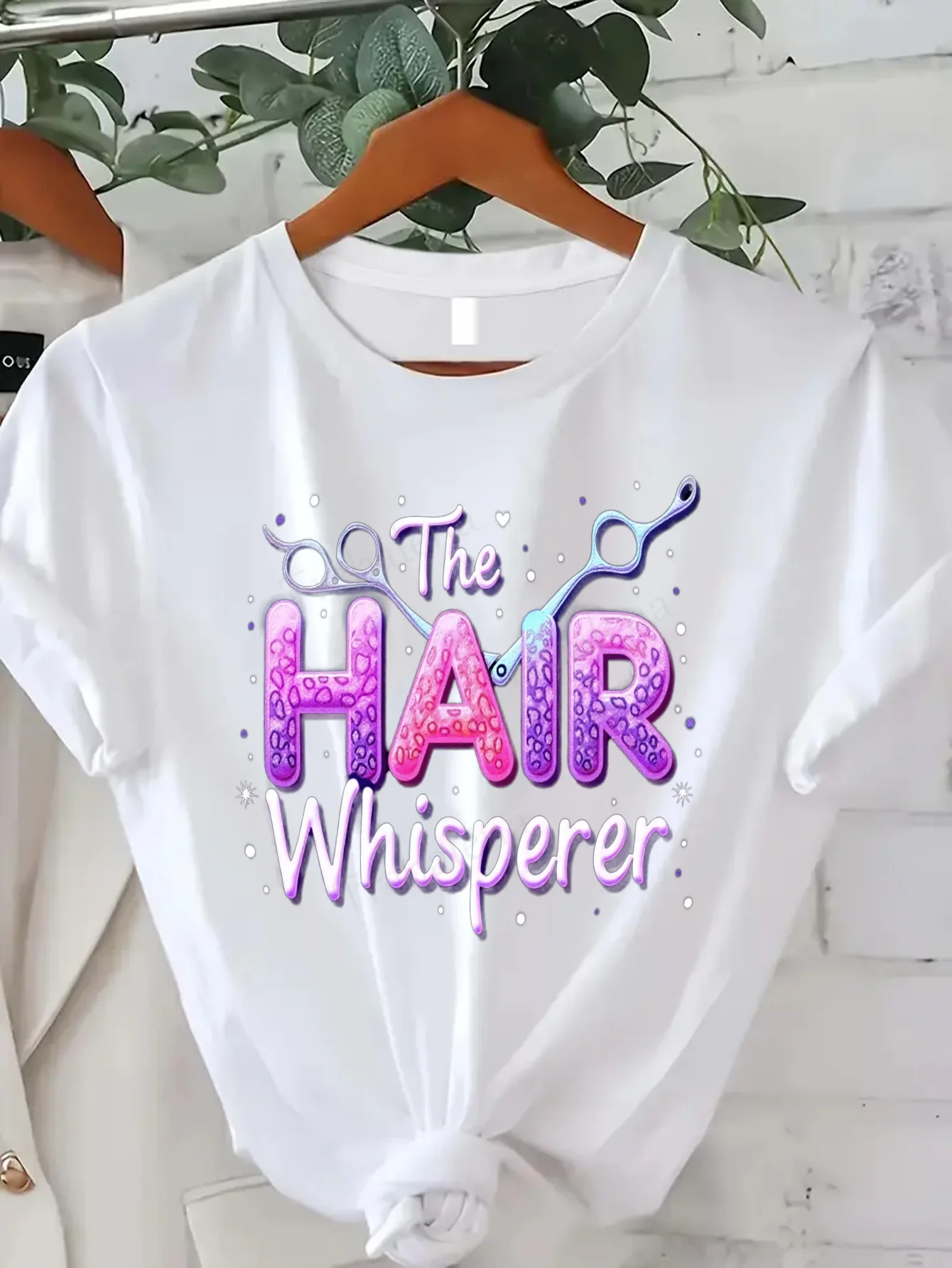 

Women T-shirt The Hair Whisperer T-Shirt for Women - Stylish & Fun