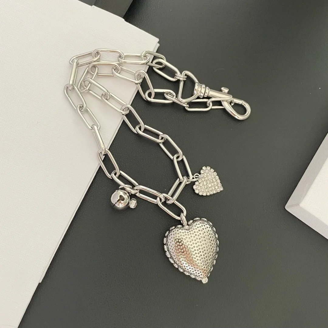 

New Light Luxury and Simple Temperament Fashion Retro Peach Heart Bell Hollow Chain Necklace