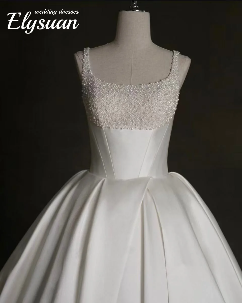 Vestidos de casamento de gola quadrada personalizados uma linha applique vestido de noiva de renda com bolsos sem costas sem mangas