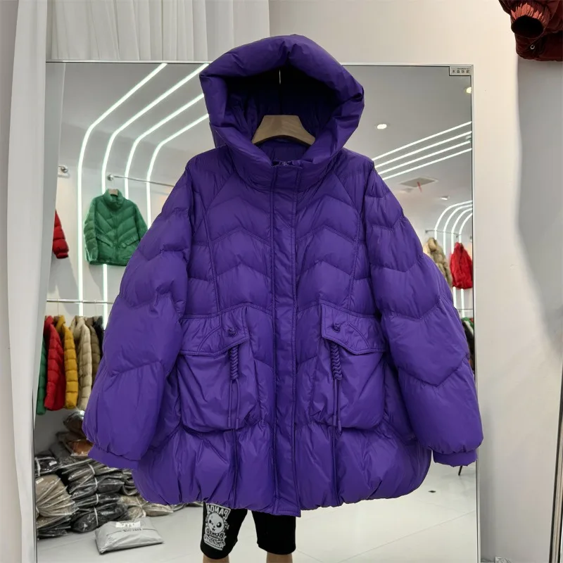 Hiver chaud nouveau à capuche en duvet de canard blanc ample vêtements d'extérieur matelassés poches manteaux vêtements pour femmes haut de gamme grande taille doudoune