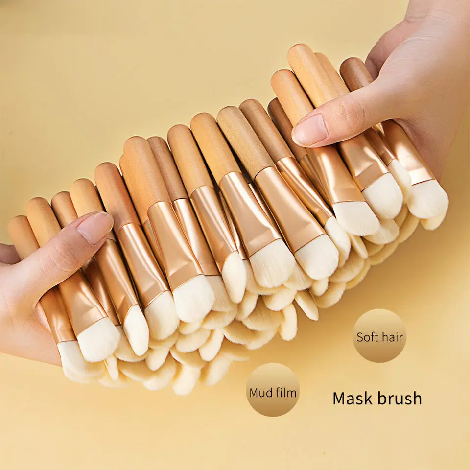 

100Pcs Engraving Logo Wholesale Liquid Foundation Wooden Face Mask Mud Brush Applicator Blending Concealer Beauty Soft Hai Tools