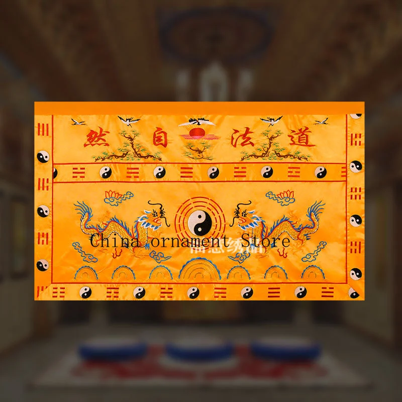 Taoist embroidery featuring cranes, twin dragons, and the Eight Trigrams, used as a table runner or table skirt, embodying the p