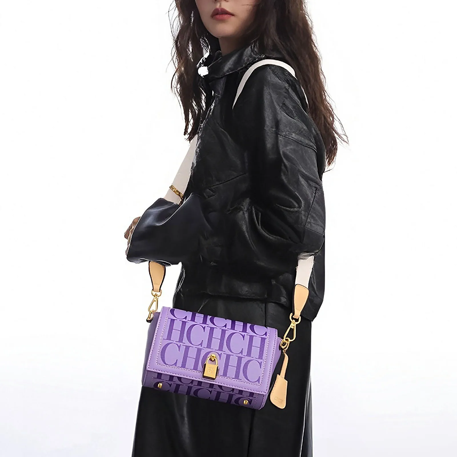 Alphabetic Artistry Multi-Tone Leather Totes Embossed Letter Patterns Gold-Toned Lock Accents  Adjustable Shoulder Straps