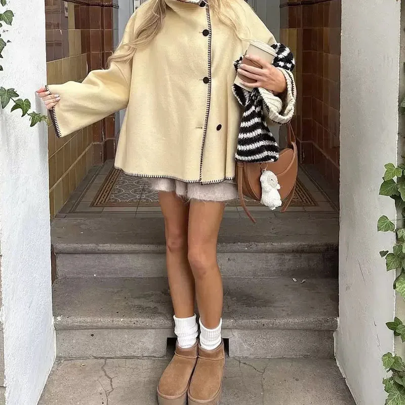 معاطف خارجية أنيقة بياقة واقفة وأزرار للنساء معاطف فضفاضة غير متماثلة بأكمام طويلة وخياطة متباينة