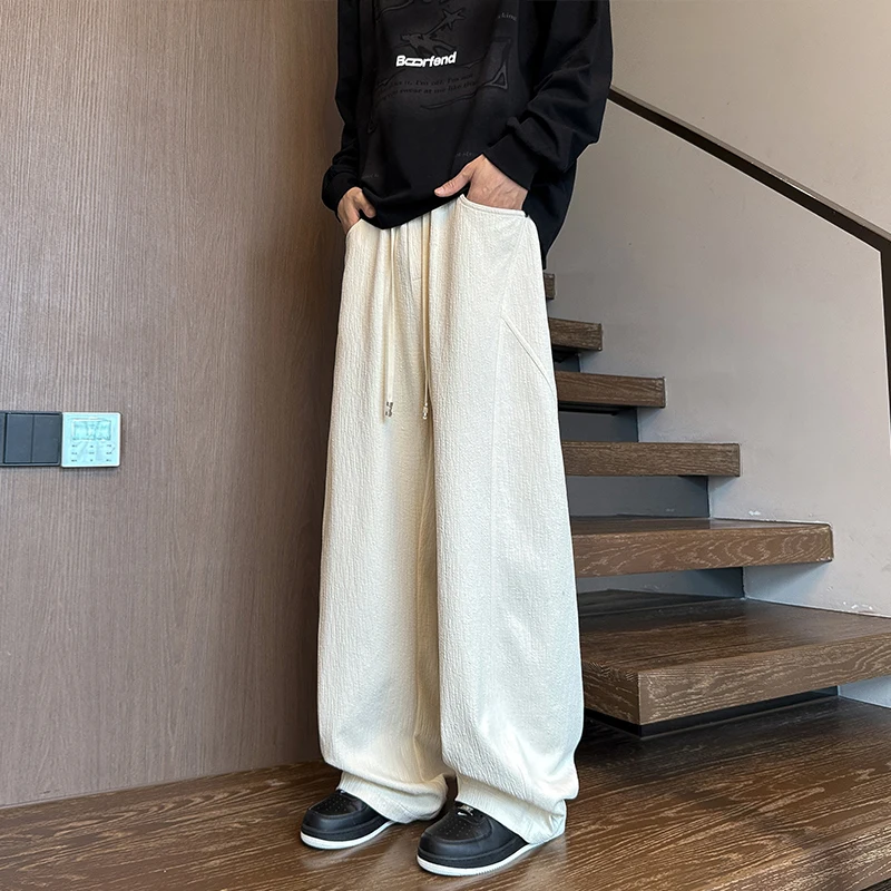 กางเกงวอร์มชายไซส์ใหญ่ M-XXXXXL สีพื้น ชายโค้ง ทรงหลวม สไตล์จ็อกเกอร์ มีเชือกผูกเอว สำหรับฤดูใบไม้ผลิและฤดูใบไม้ร่วง