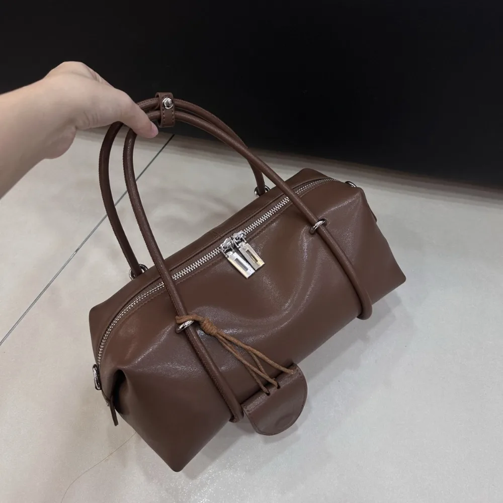 Early Autumn New Niche Design Retro Versatile Commuter Leather Handbag Simple Pendant Armpit Bag Texture Unique Fashion Simple