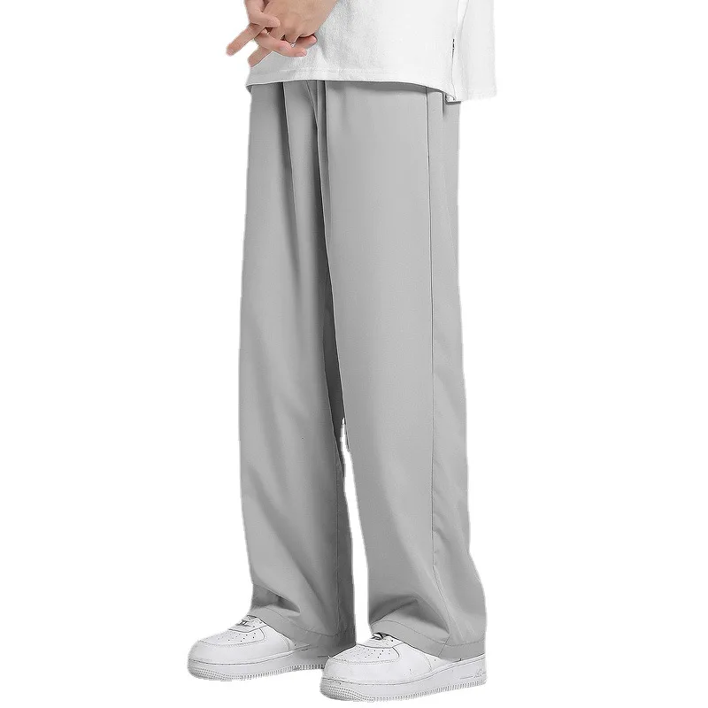 Neue Sommer Freizeit hose Männer atmungsaktive Polyester koreanische Mode halb breite gebänderte Taille Hosen gerade lose Hosen