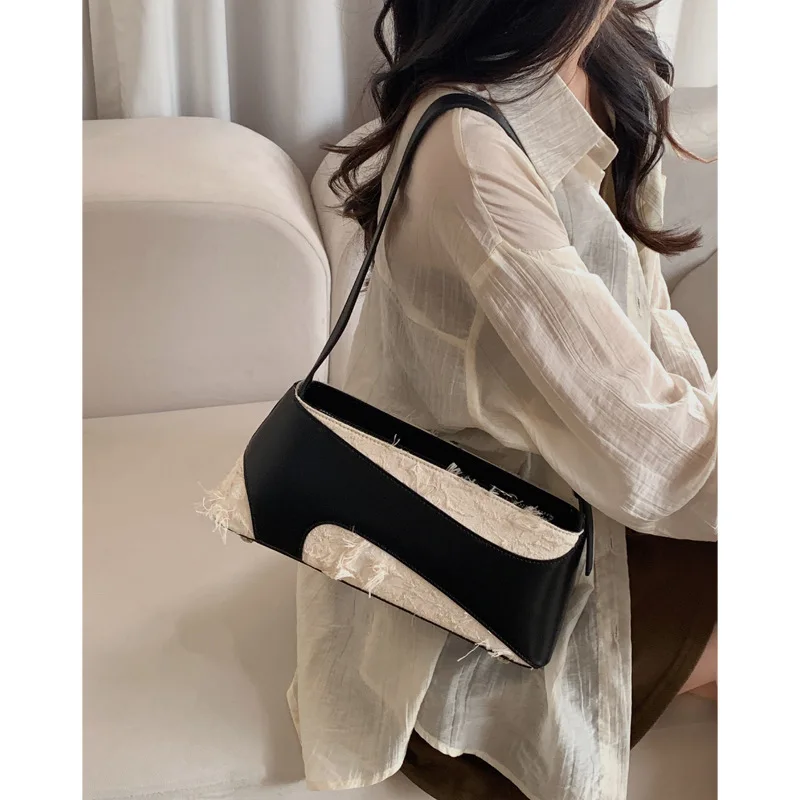 

2024 New Elegant French Underarm Bag Niche Spliced Color Design Tassel High End Shoulder Pack Modern Popular Leisure Handbag