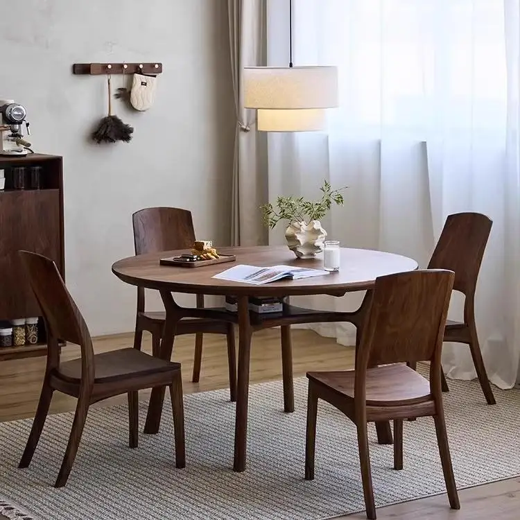 

New Chinese-style solid wood dining table and chairs North American black walnut home round table round medieval style new Chine