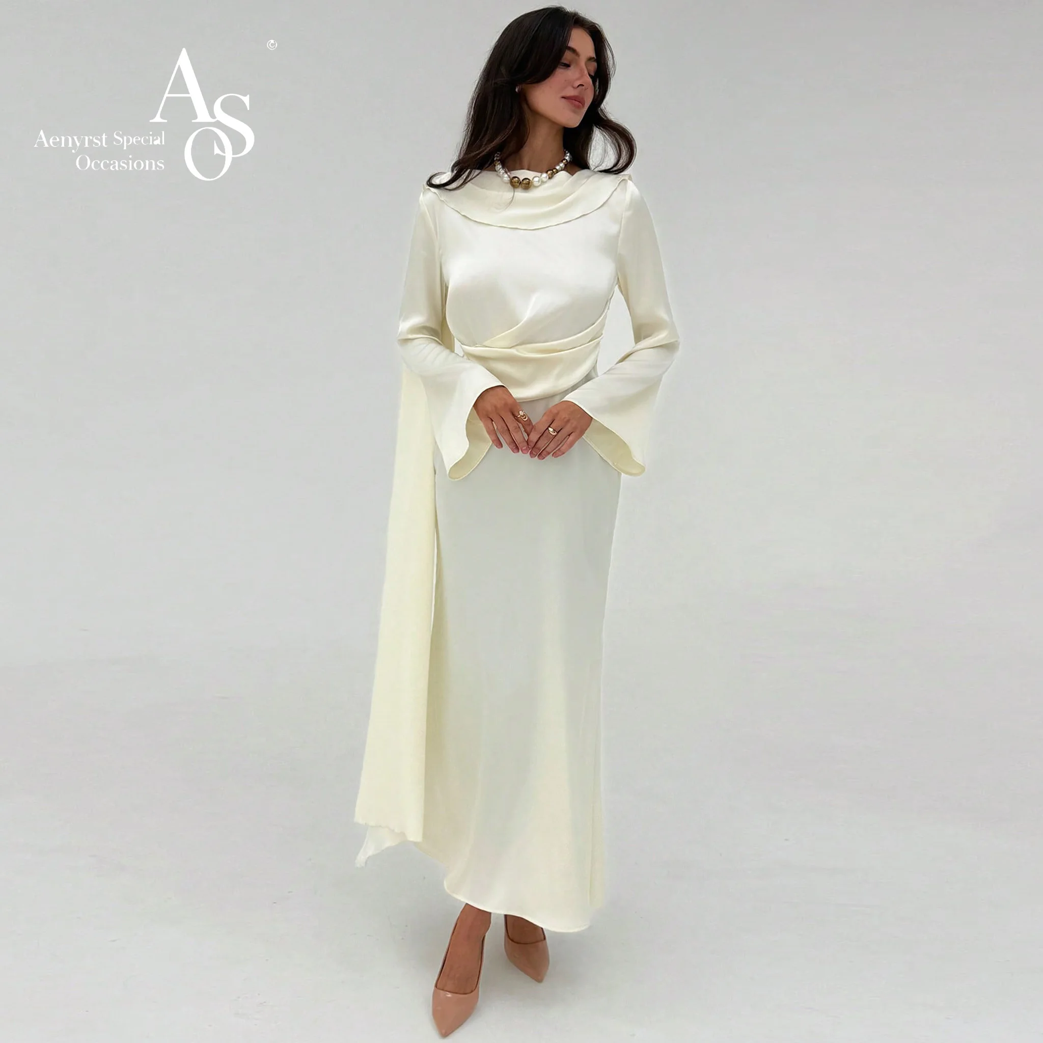 An elegant ivory long-sleeved backless pleated ankle-length dress, suitable for formal occasions and graduation dances.