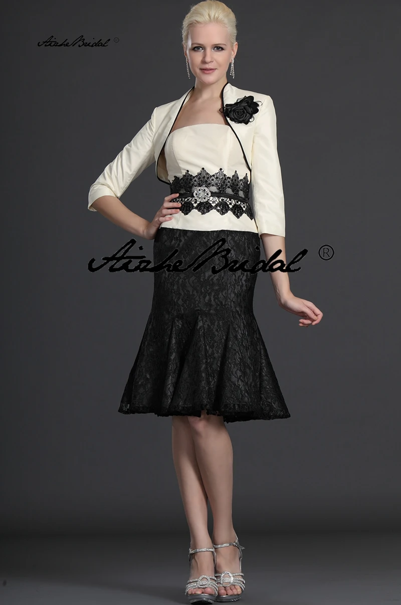 فستان حفلات الزفاف فستان قصير لأم العريس بألوان متباينة عاجية وأسود بدون حمالات فستان أم العروس مع سترة #1