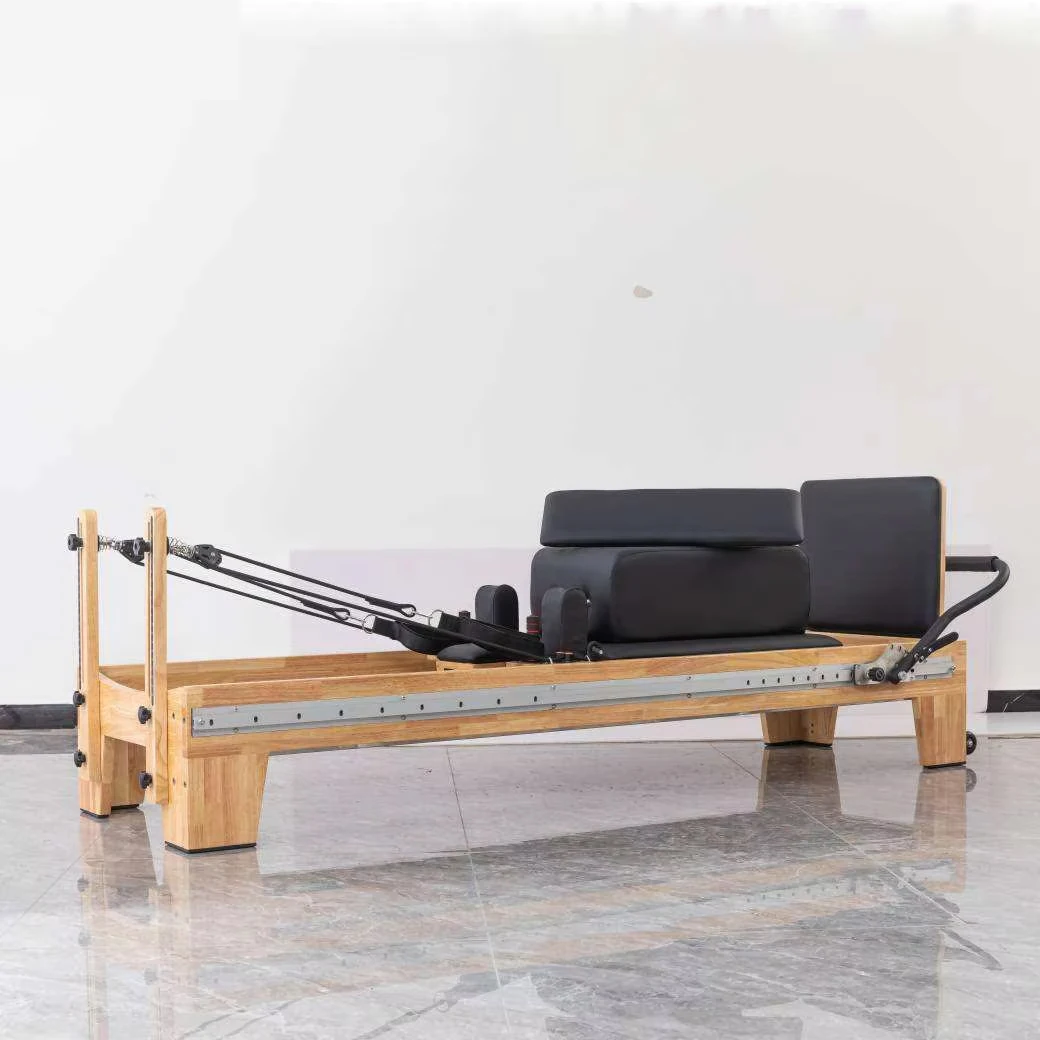

Infinity Wood Reformer Pilates Reformer Machine Footbar Moving Back And Forth