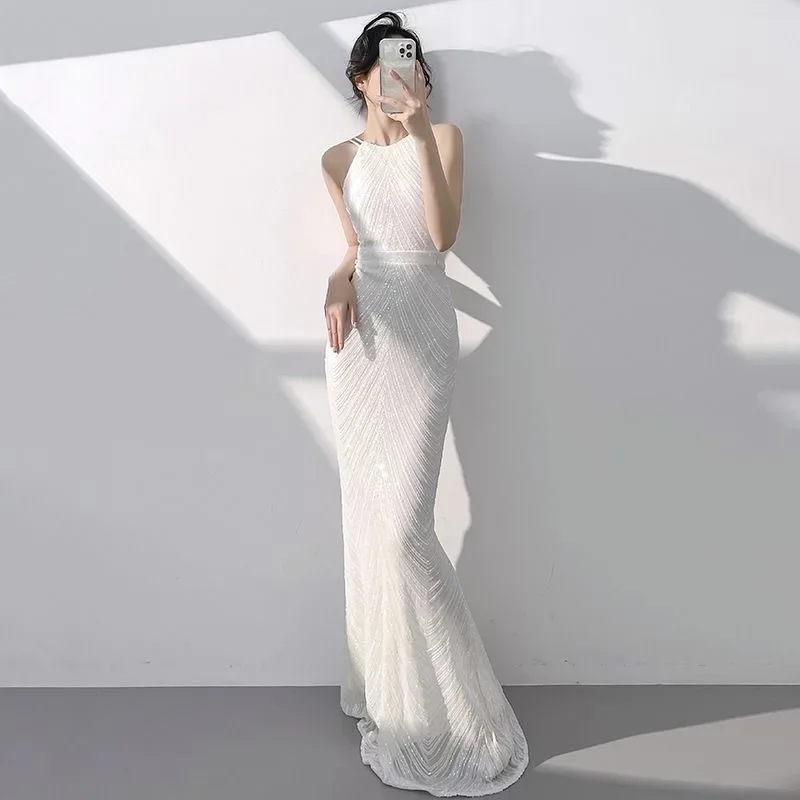 

Evening dress No. 29 female 2024 new host fishtail sequin temperament high-end light luxury niche halter neck dress