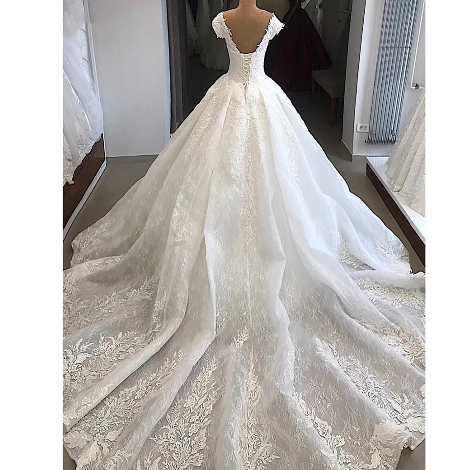 Customized Illusion Floral Sequined Appliques Lace Backless Zipper O-neck Long Sleeve Ball Gown Bridal Wedding Dresses 2024 Sexy