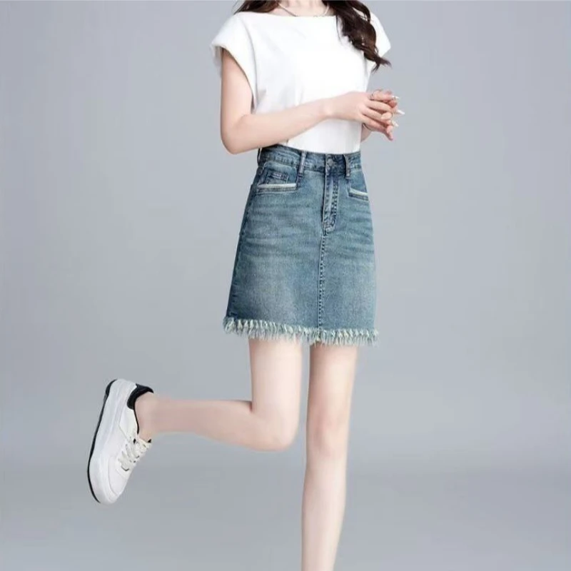 

Новинка Весна-Лето: Женская джинсовая мини-юбка с высокой талией, облегающая, с бахромой по низу, легкая, тонкая, А-силуэт, обтягивающая, на одно плечо ​