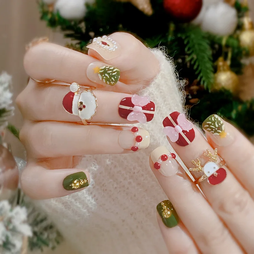24 Uds uñas postizas redondas cortas de Navidad lindo dibujo de Papá Noel patrón de árbol de Navidad prensa en el lazo de uñas decoración de perlas uñas postizas dulces