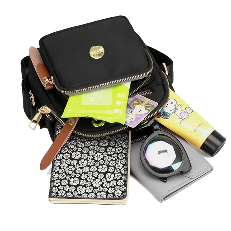 Neutrale, kompakte Mini-Taschen für Damen und Herren, ideal für Reisen und Ausflüge, mit einem schlichten Design für die Nutzung über eine Schulter. – Detail 3