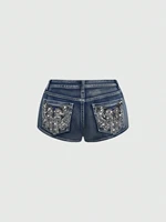 Shorts de mezclilla de tiro bajo desgastados para mujer, estilo vintage Y2K punk, pantalones cortos bordados.