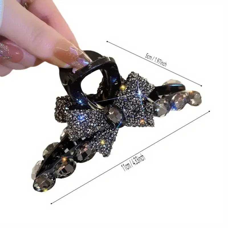 Elegant large acrylic bow hair clip with sparkling rhinestones - a fashionable solid color accessory for women and girls