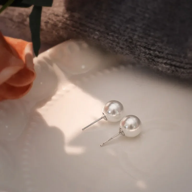 

S925 silver French Shijia pearl stud earrings popular light luxury niche temperament light bulb earrings