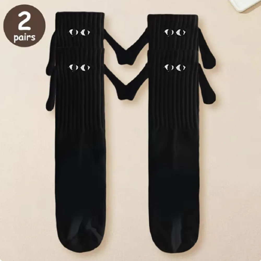 2/4/6/10 paires chaussettes magnétiques avec mains femmes hommes mode noir blanc drôle mignon dessin animé yeux Couple mi Tube chaussettes pour cadeaux