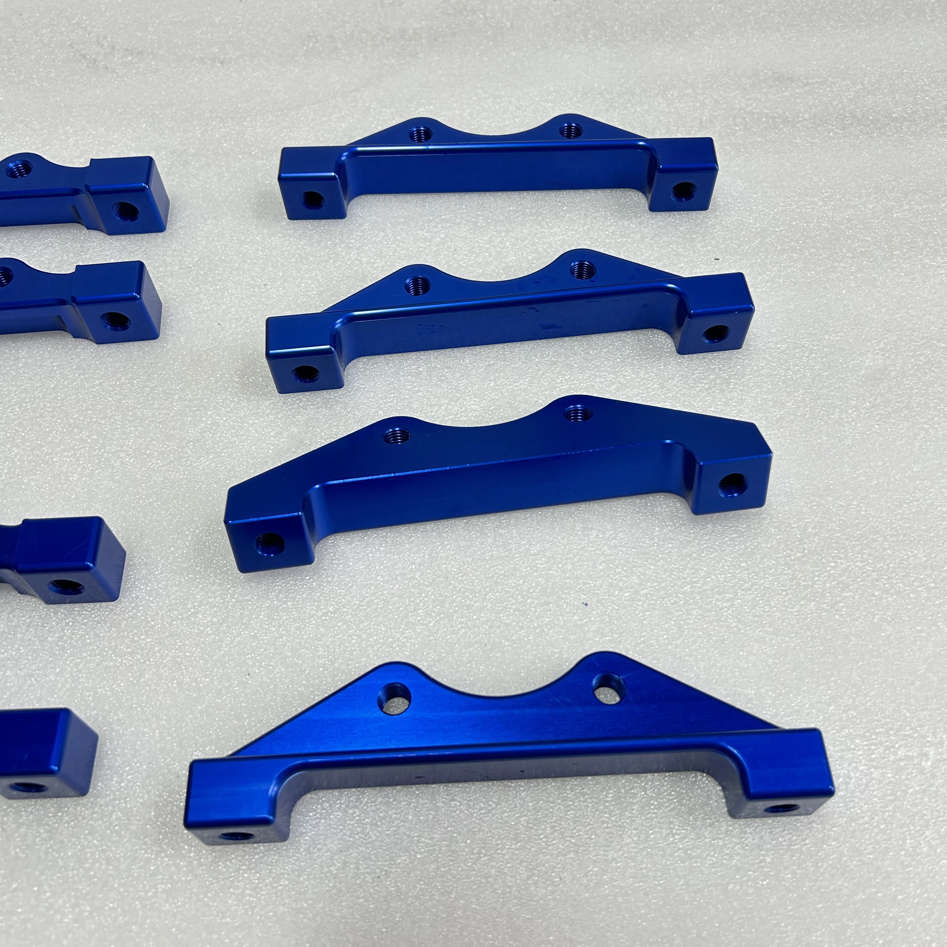 High-performance OEM Brake Aluminum Bracket Adapter for BMW Toyota Mazda Honda Civic VW Golf Nissan 370Z Yaris Benz Audi Subaru