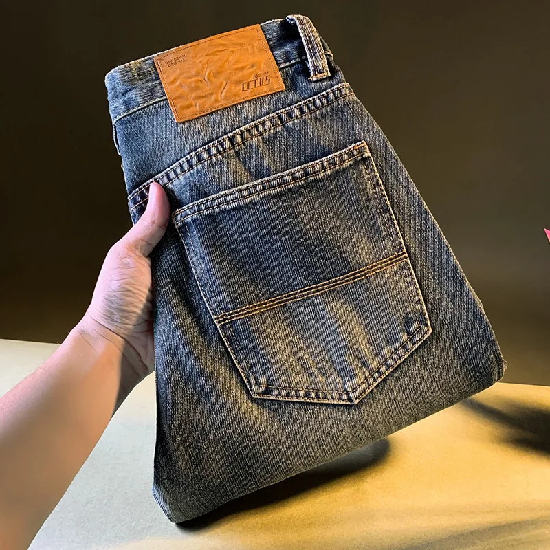Vaqueros de mezclilla lavados retro de alta gama para hombres en otoño de 2025, nueva ropa para hombres versión coreana pantalones sueltos y suaves de tubo recto