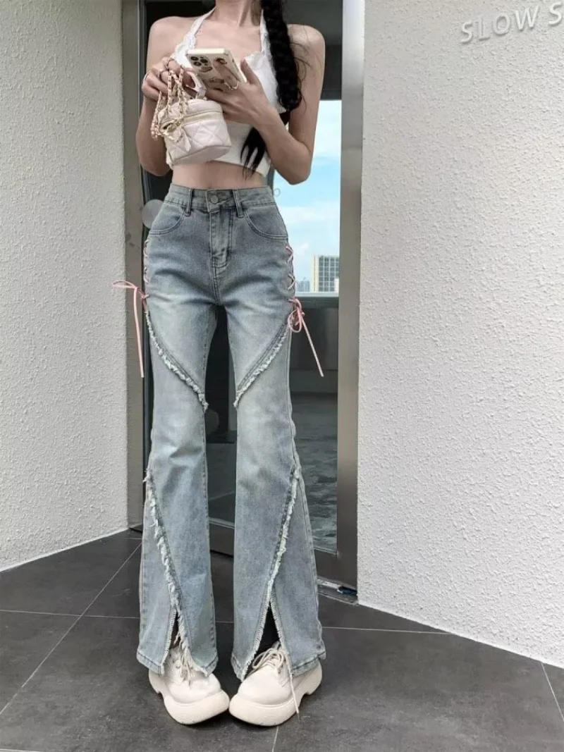 Ropa de cintura alta con cremallera para mujer, pantalones sueltos Retro femeninos con borlas, pantalones Micro acampanados, ribete deshilachado, ropa de calle con agujeros, pantalones vaqueros de mezclilla