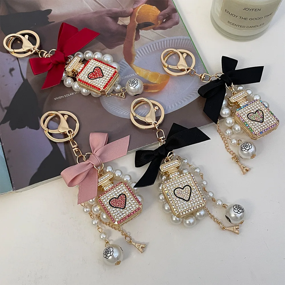 luxury keychains big brand New Handmade Bowknot Pearl Key Chain with rhinestone perfume Bottle Car keychain Women's Bag Pendant