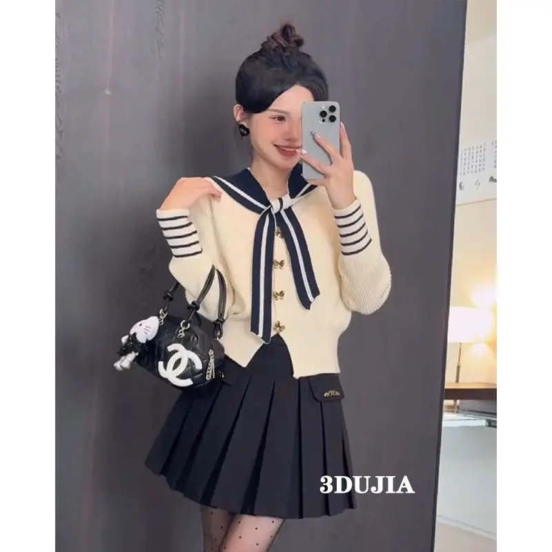 Suéter de malha xale com pescoço marinho coreano para mulheres outono e inverno exclusivo botão borboleta elegante e versátil corpo fino