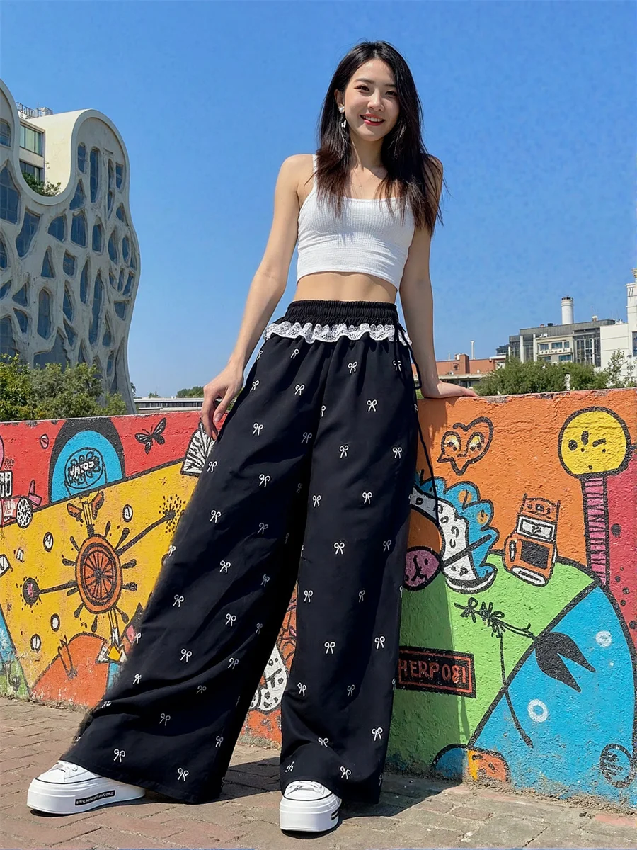 กางเกงขายาวทรงพาลาซโซผู้หญิงแบบผูกเชือก ทรงหลวม สไตล์ฤดูใบไม้ร่วง เอวสูง ทรงเข้ารูป ยืดหยุ่น เซ็กซี่ เหมาะสำหรับงานปาร์ตี้กลางคืน สีดำเงา