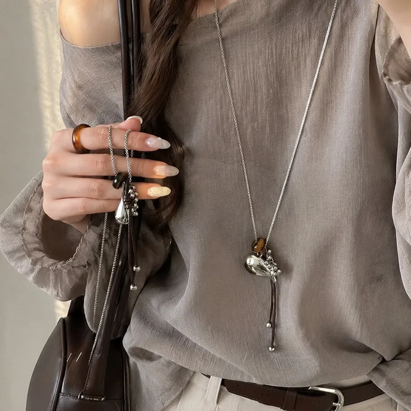 Vintage Knot Pendant Necklace: Unique Silver Fish-Shaped Spoon-Style Long Sweater Chain—Versatile Casual Accessory